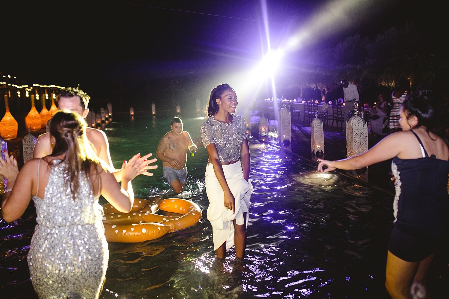 Moroccan Wedding Photographer - Bride dancing in the pool