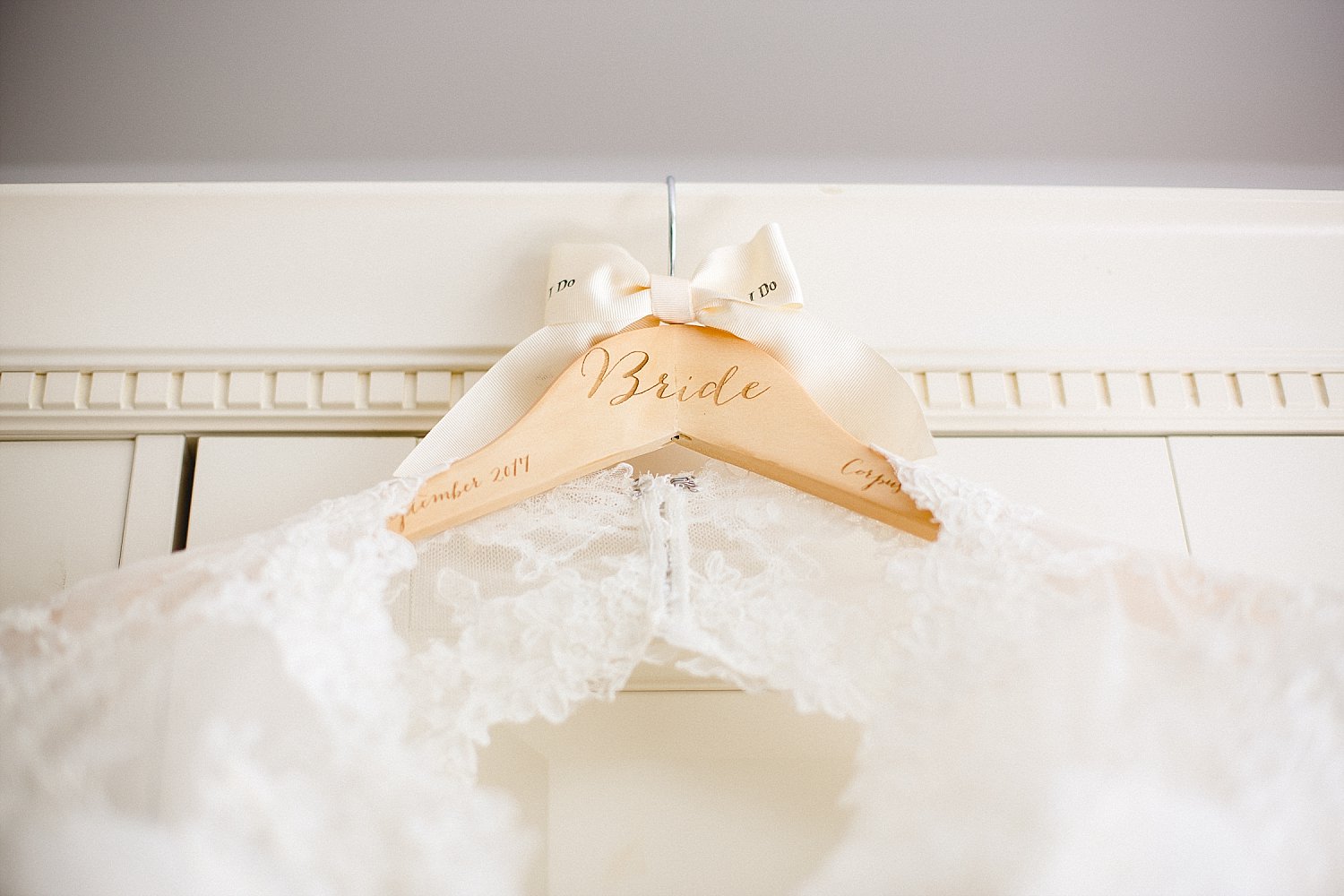 Moor Hall Essex Wedding Photographer - Bridal Gown on Bespoke Hanger