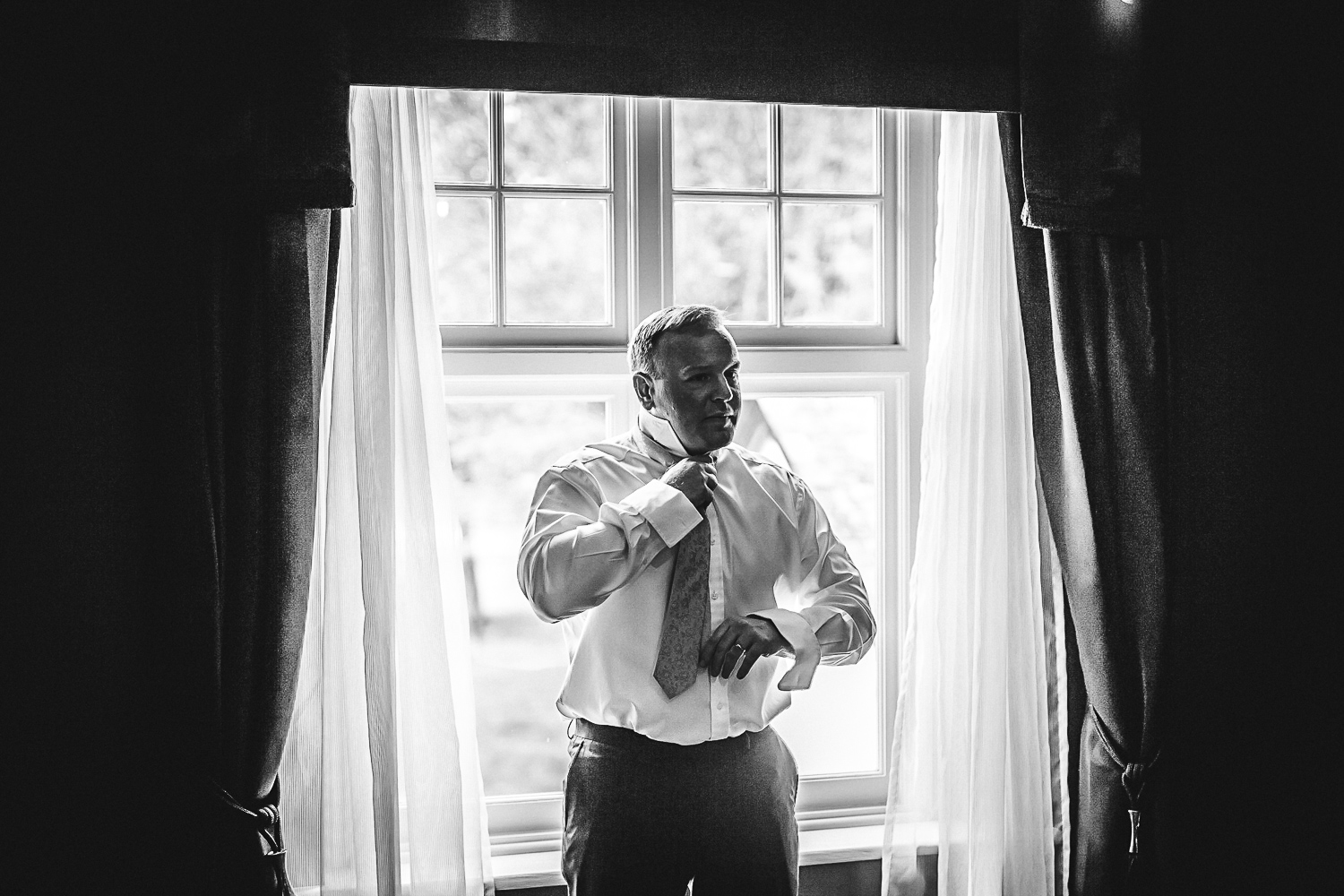 Bestman getting ready - Swynford Manor Wedding Photographer