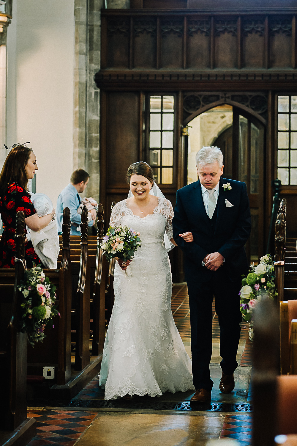 Bride Walking Down the Aisle at Cottenham All Saint’s Church - Swynford Manor Wedding Photographer