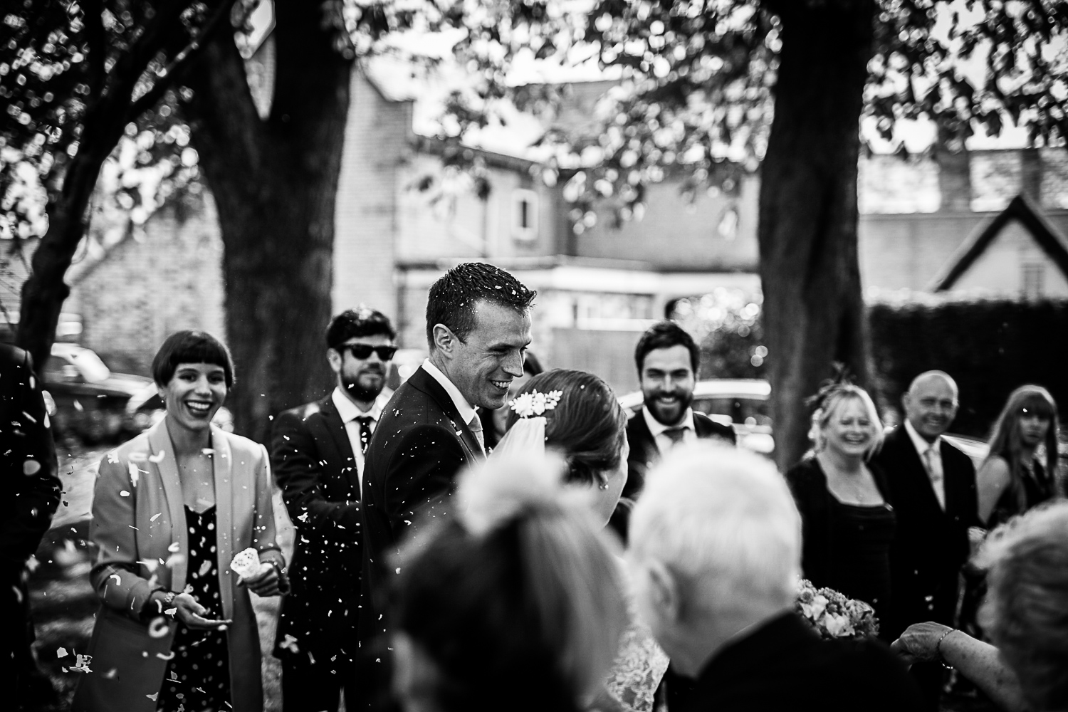 Confetti in the gardens at Cottenham All Saint’s Church - Swynford Manor Wedding Photographer