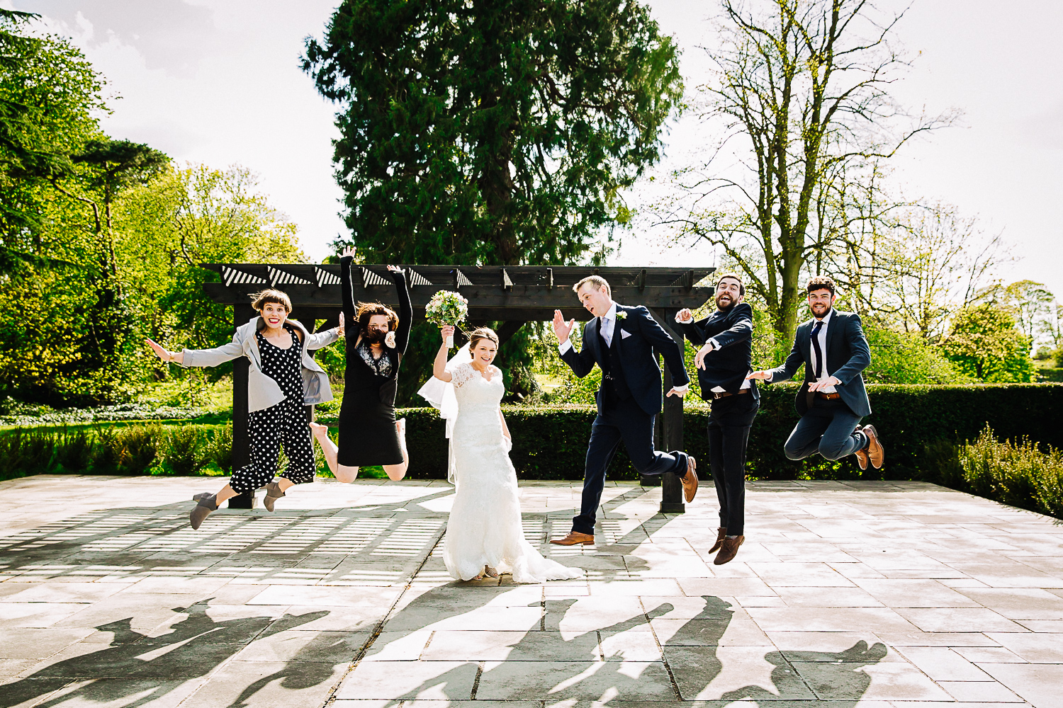 Guests Jumping Shot at Swynford Manor Wedding