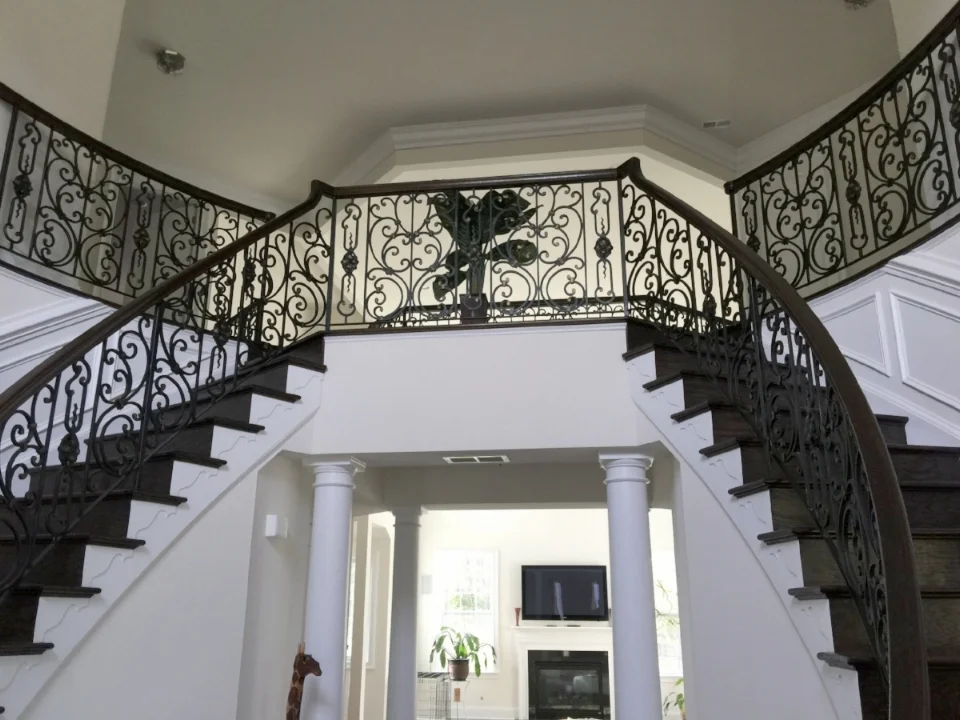 Grand Dual Staircase and Balcony