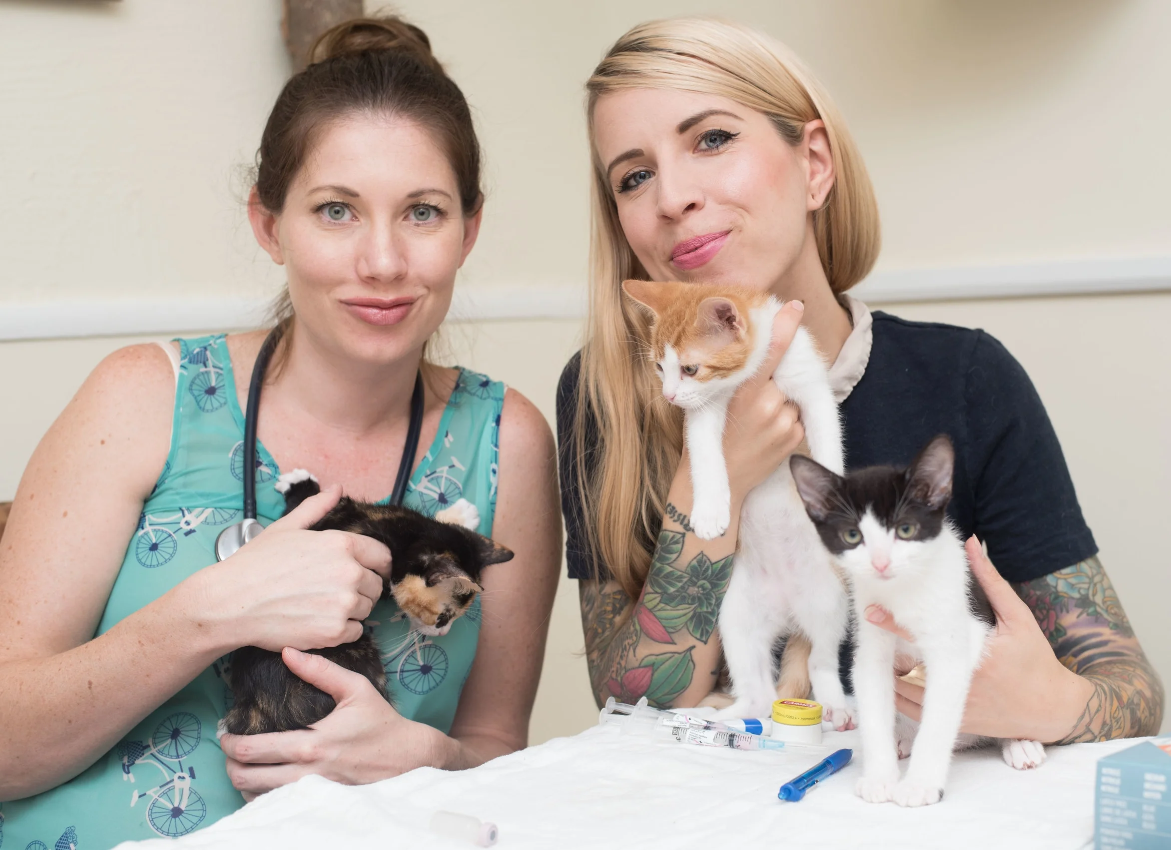 Dr. Erica and Hannah with kittens Bandit, Squeaky, and Bear. 