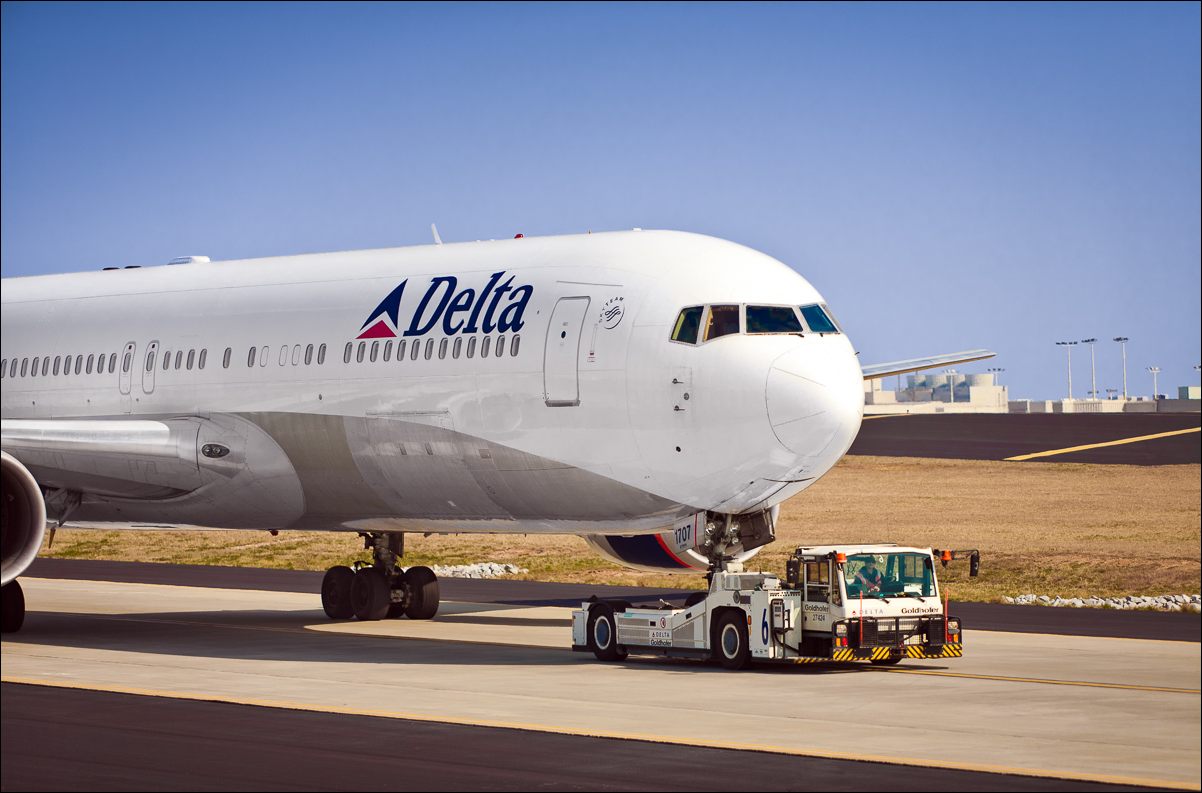  A Delta Air Lines Boeing 767-332 (ER) (WL) being towed at Hartsfield-Jackson Atlanta International Airport.