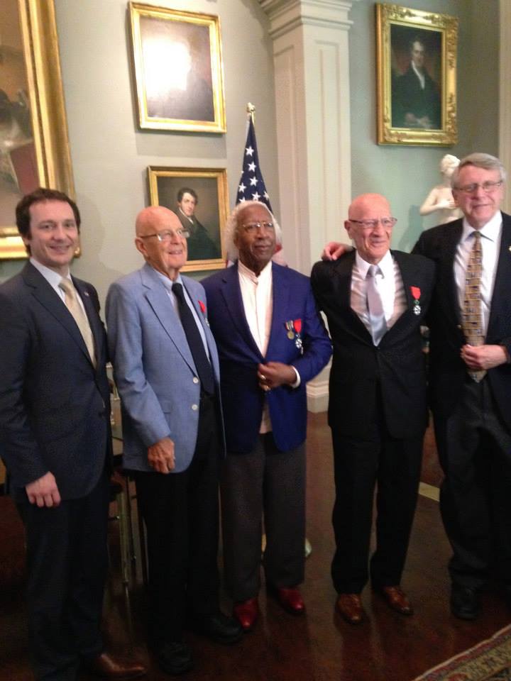 The Consul General and Hoffman with three WWII Veterans