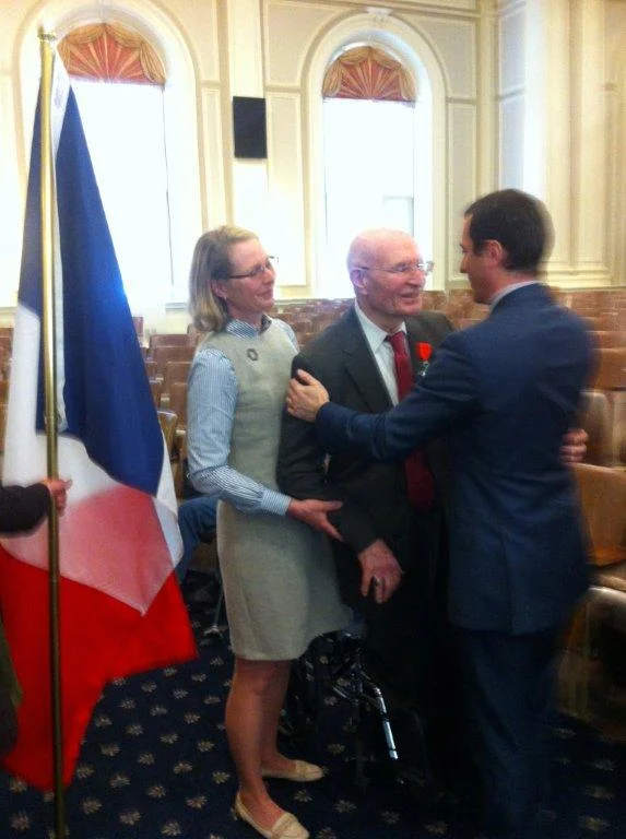 Consul General Fieschi awards a Legion of Honor medal to a NH WWII veteran