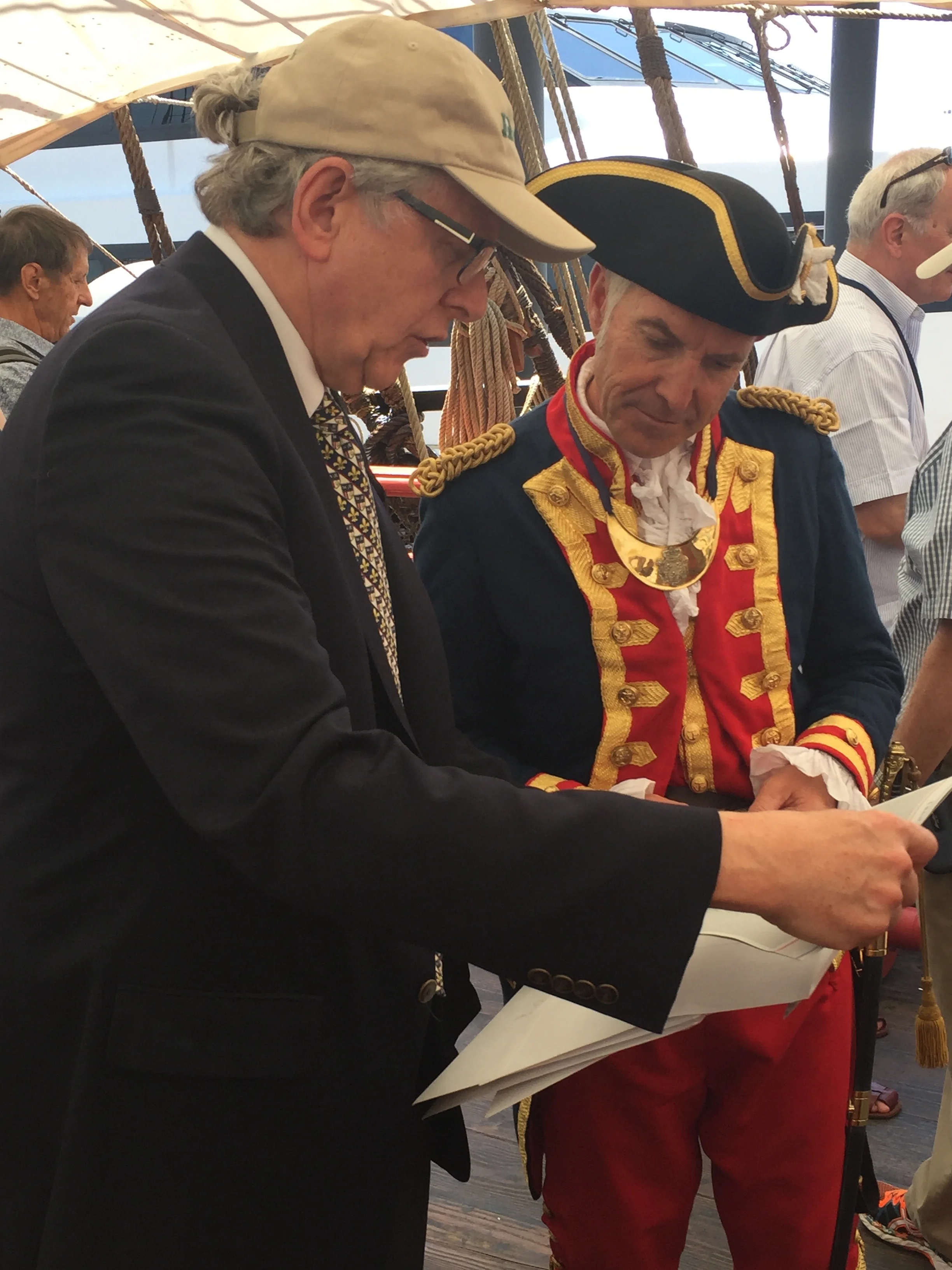 President Hoffman presents the Captain with a gift