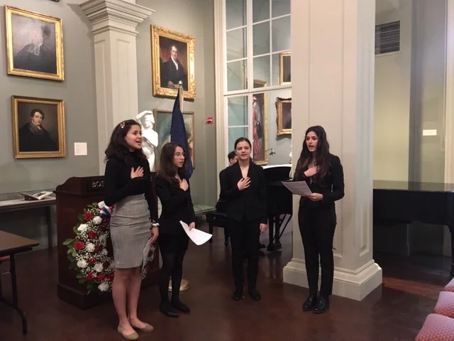 The choir of the International School leads us in the singing of the two National Anthems.