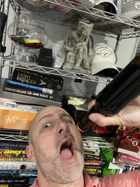 Mark C. Frankel figures out what he should do with a bottle of beer