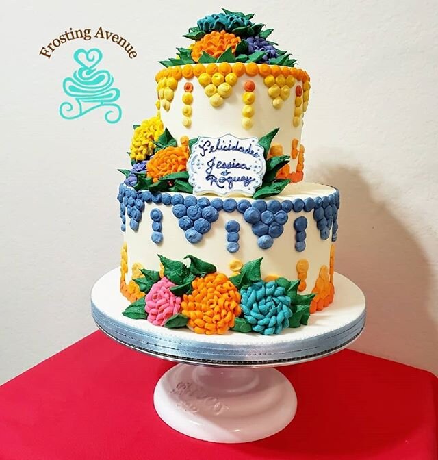 You say Fiesta! We say bright happy colors! .
.
This beautiful wedding cake was made for a wonderful couple who wanted to incorporate their Mexican culture into their special day. .
.
Upon delivery we were mesmerized by the decorated space. An intima