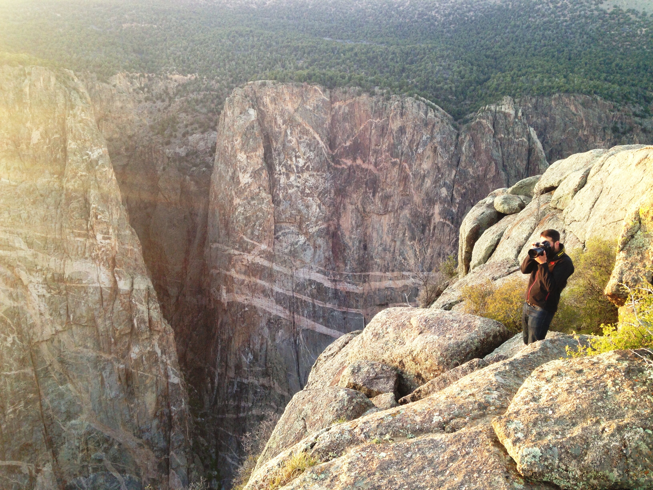 The Painted Wall of Black Canyon, during sunset. Don't try this at home. Photo by Kassondra Cloos
