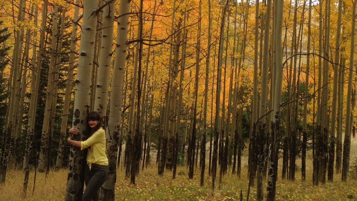 I am almost positive Kate will protest this picture. But I don't care. She is hugging fall, and fall is great. Photo by Kassondra Cloos