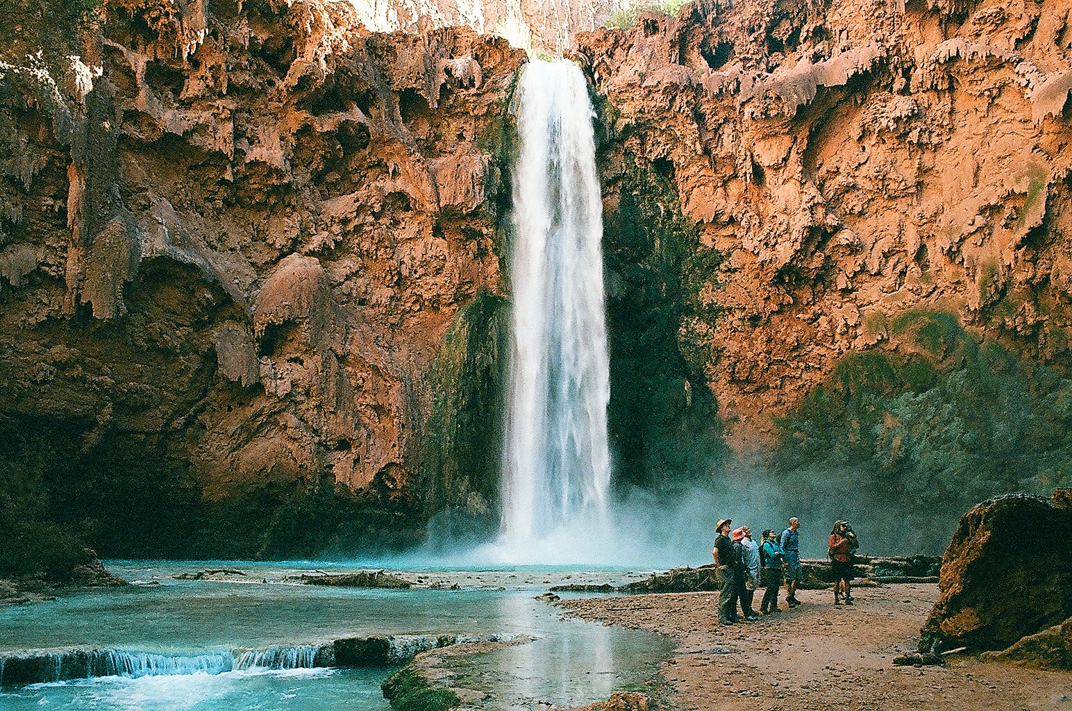 Getting to Mooney Falls is no joke. It's hard not to stare at the painstaking process of climbing down the slippery steps carved into the steep cliff. 