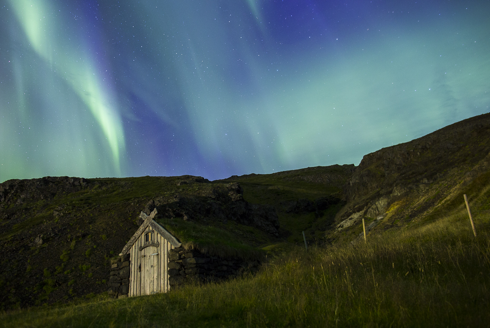The Northern Lights from Gudrunarlaug, a legendary hot pool in west Iceland. // Nick Cote