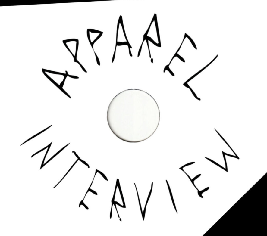 Vinyl record with the words "APPAREL INTERVIEW" written in black marker around the center hole.
