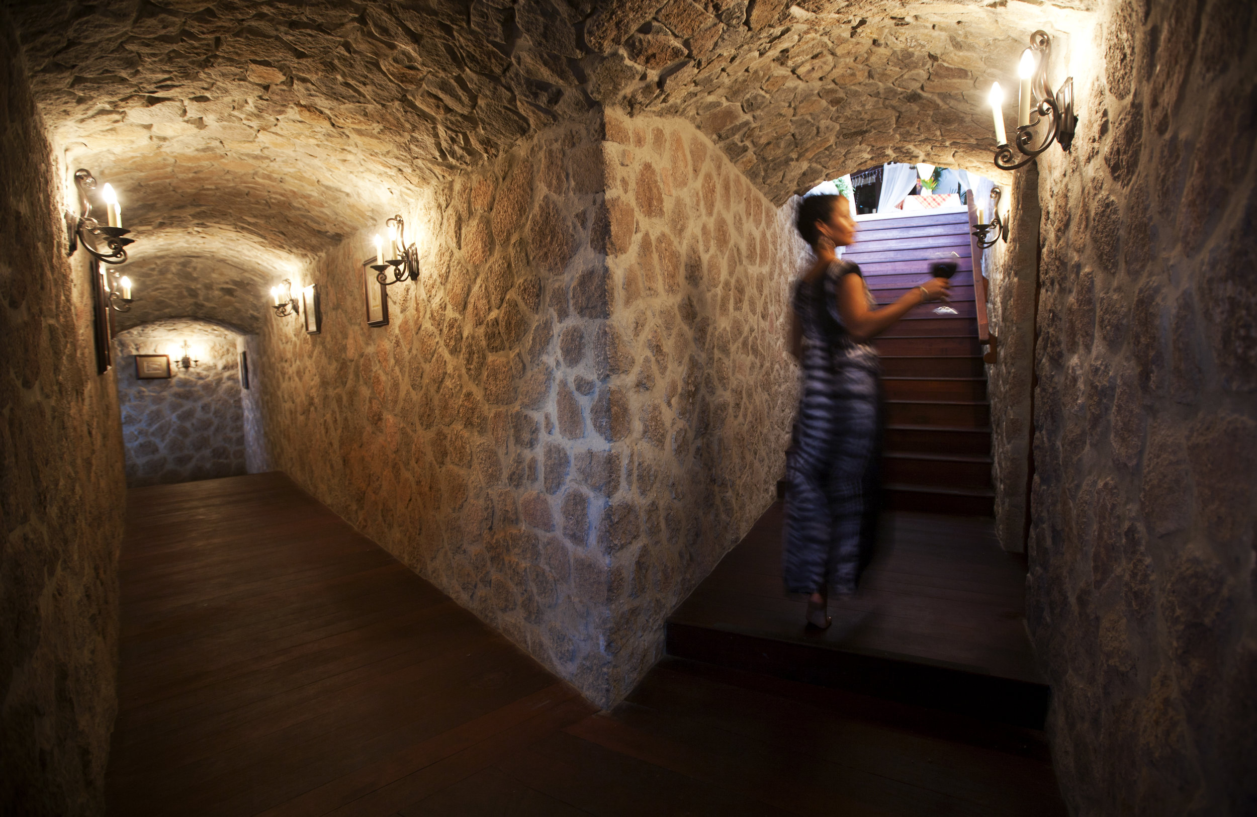 Ti Kaye - Stone cave walkway (to bar and wine cave).jpg