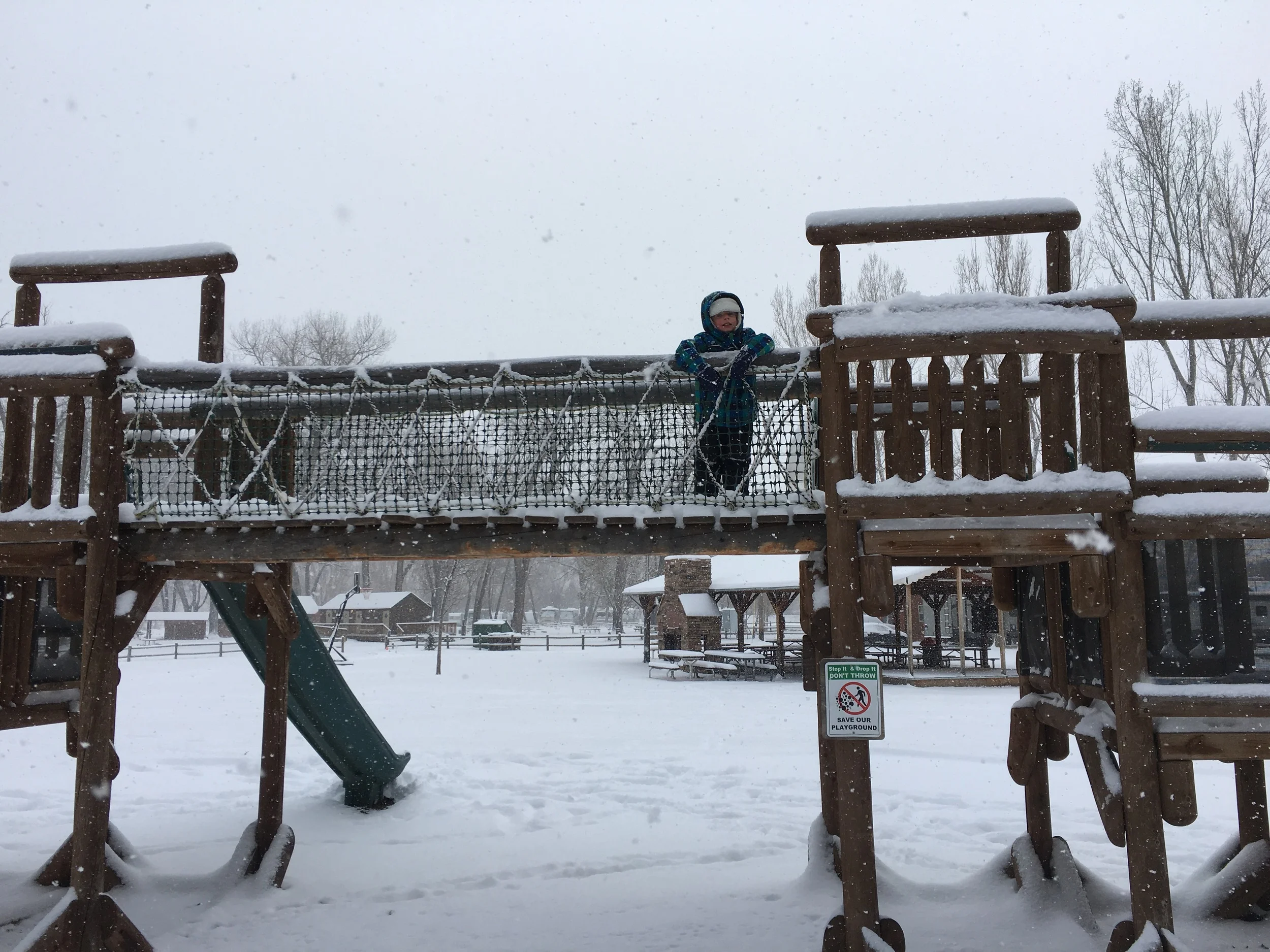 Probably the best part of our parking spot is being right across the road from the park. Even covered in snow it's hard to keep the munchkin away!
