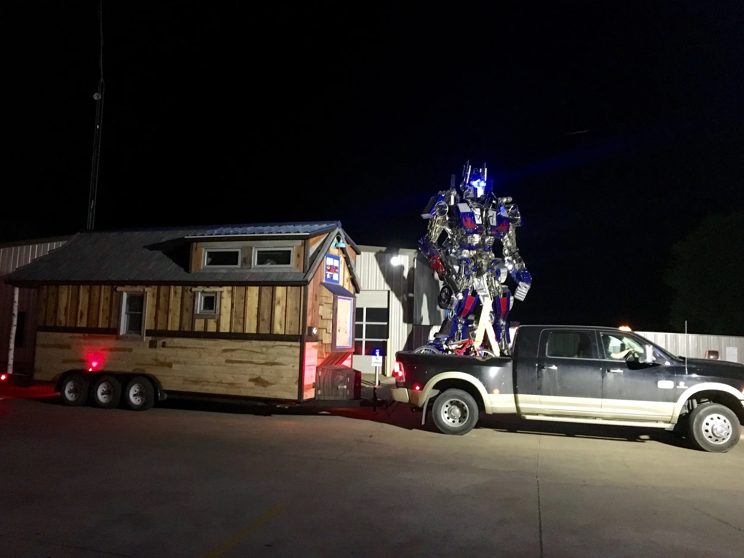 And holding down the fort across town was Optimus Prime, who towers over the tiny house at 22' tall. 4/4/16