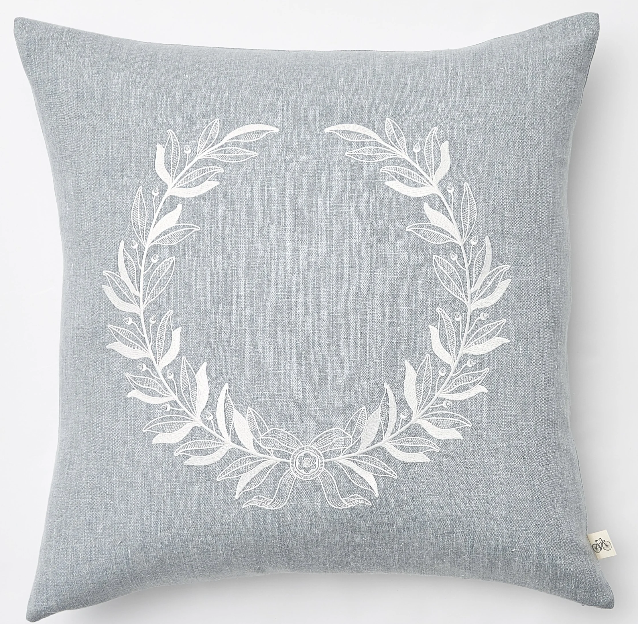 Embroidered White Laurel Wreath on Light Blue Heathered Belgium Linen Pillow