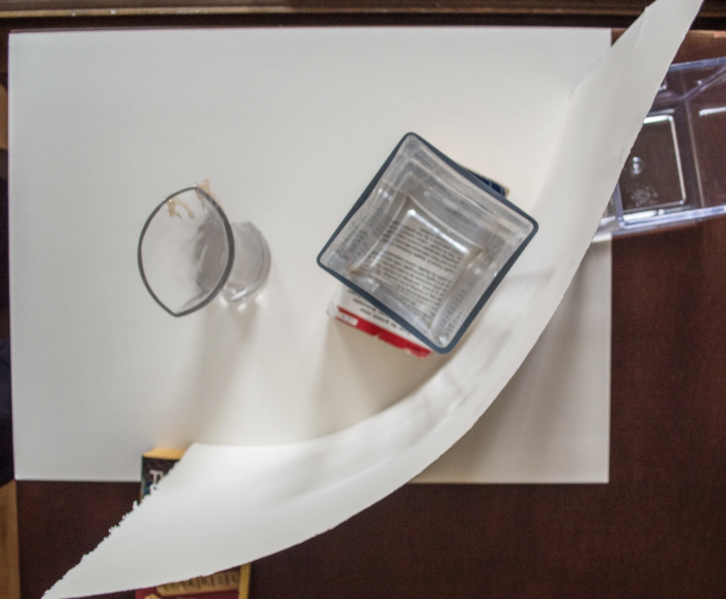 Similar setup, as seen from above. Instead of shooting into the window, this time I'm shooting perpendicular to the window, with glass-in-front-of-white-paper as the backdrop.