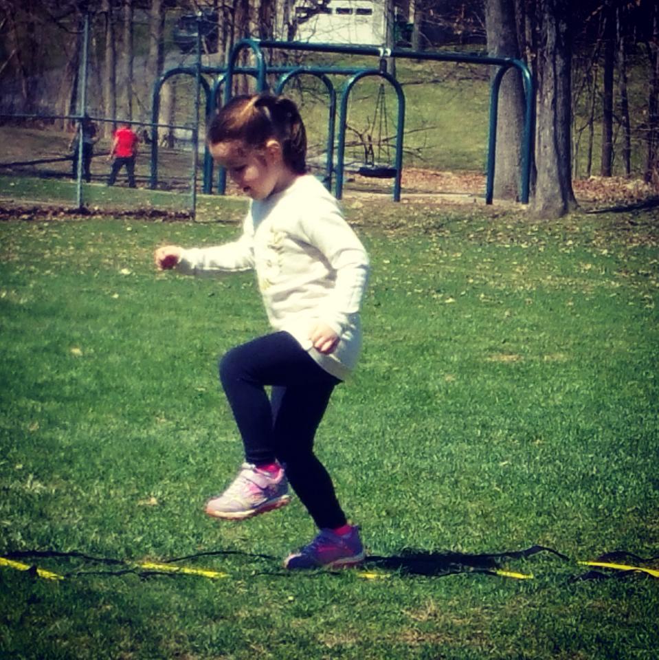 Olivia, tackling the obstacle course.