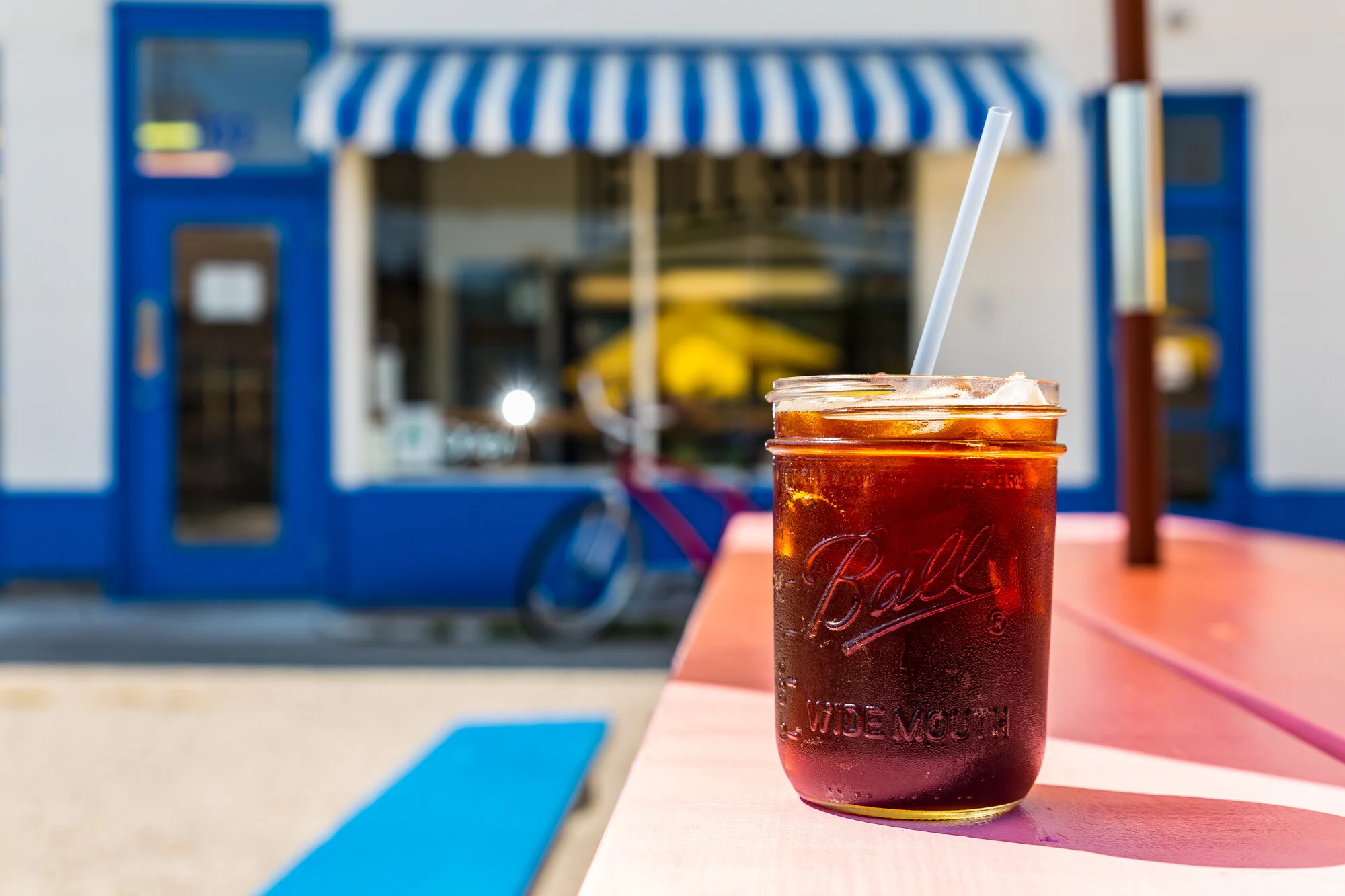 Full Stop Station iced coffee on the patio