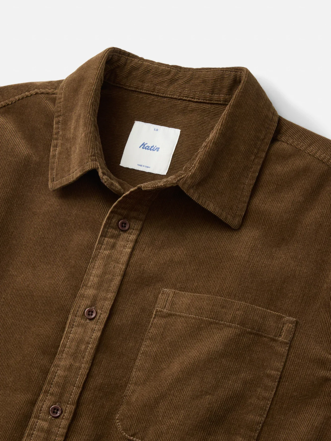 katin-fa26-shirts-granada-shirt-brown-ecom-flat-lay-03-detail-v2_5000x.webp