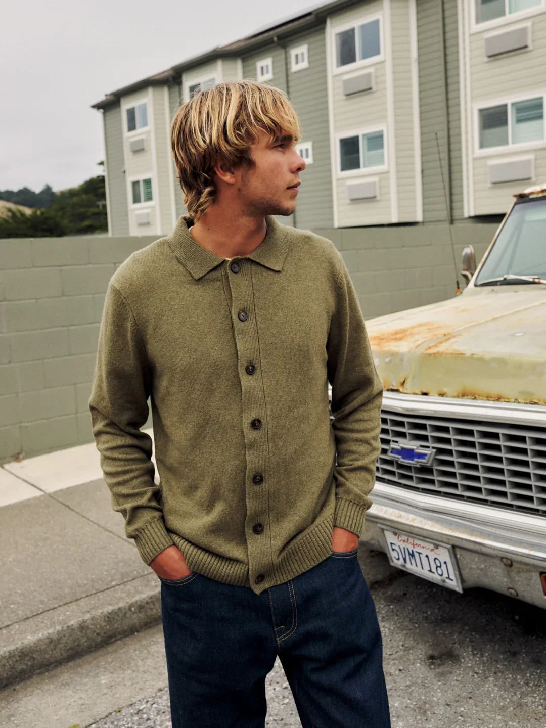 katin-fa26-sweaters-conor-sweater-heather-olive-patterson-raw-indigo-lifestyle-frame-0093_v2_5000x.webp
