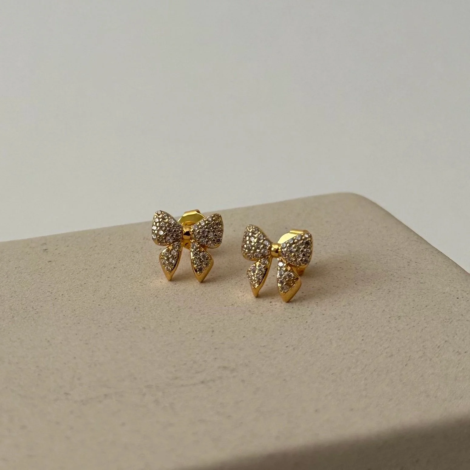 Pave Bow Studs Cubic Zirconia & Gold