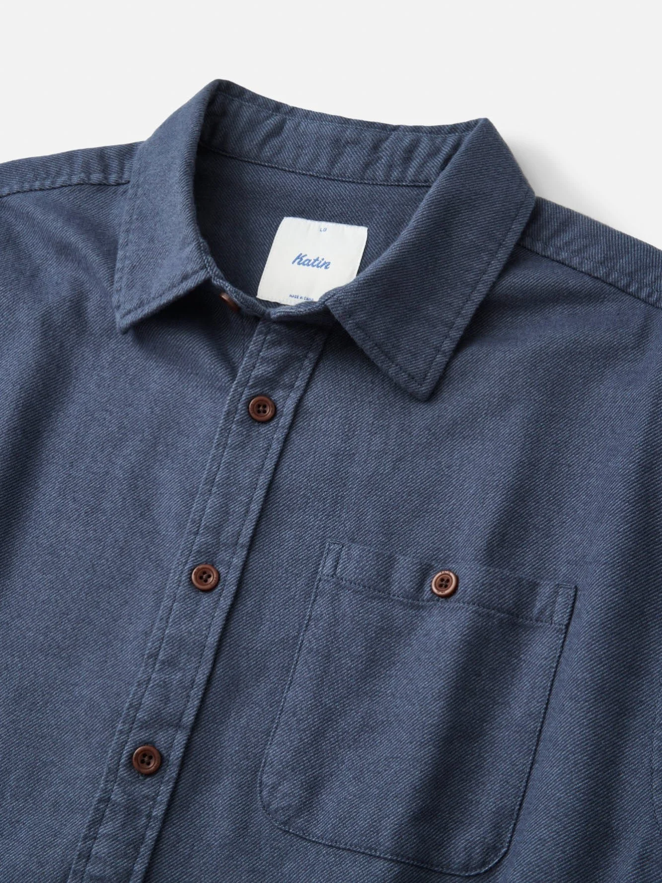 katin-fa26-flannels-twiller-flannel-tempest-blue-ecom-flat-lay-03-detail-v2_5000x.jpg