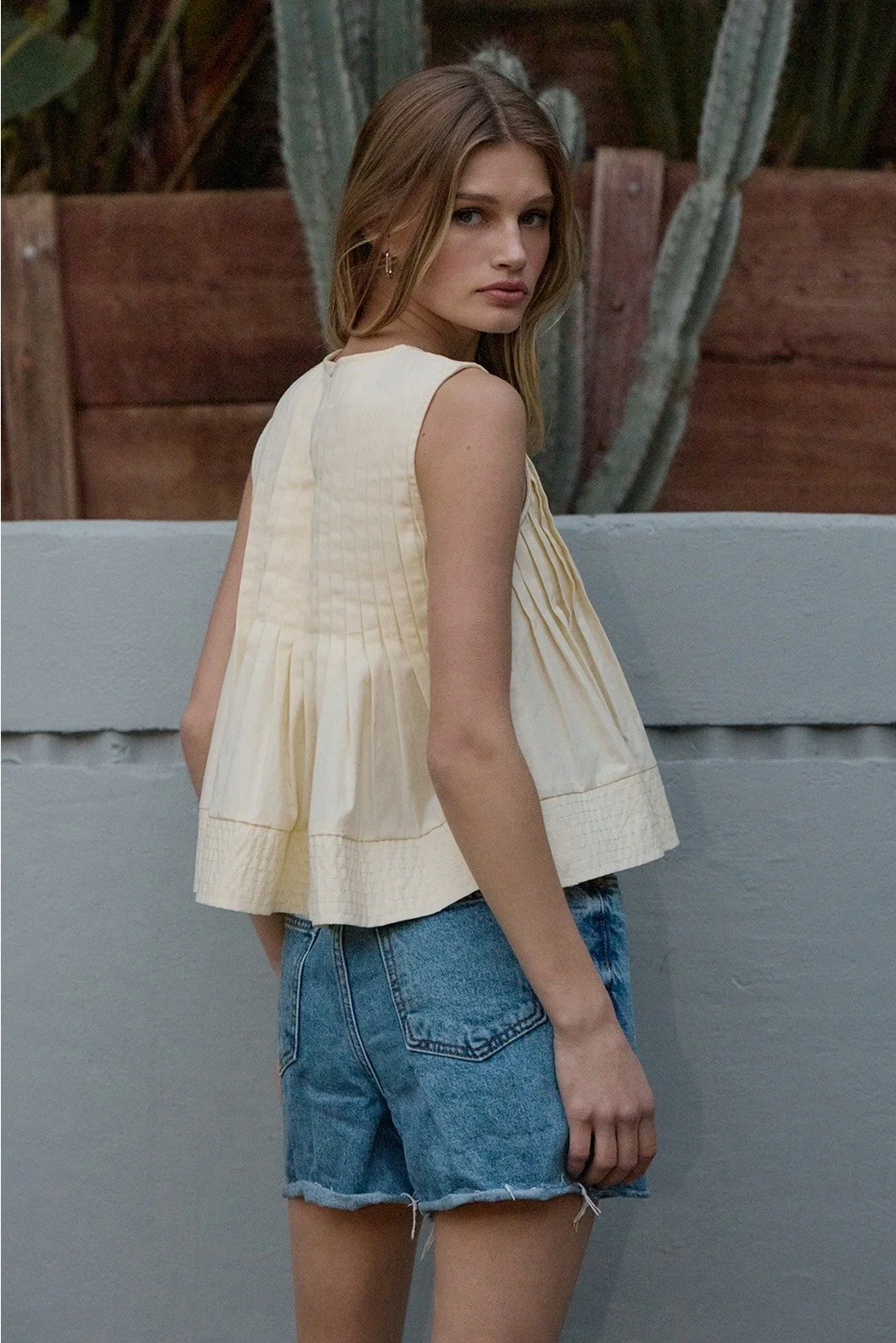 Pleated Flare Sleeveless Blouse Butter