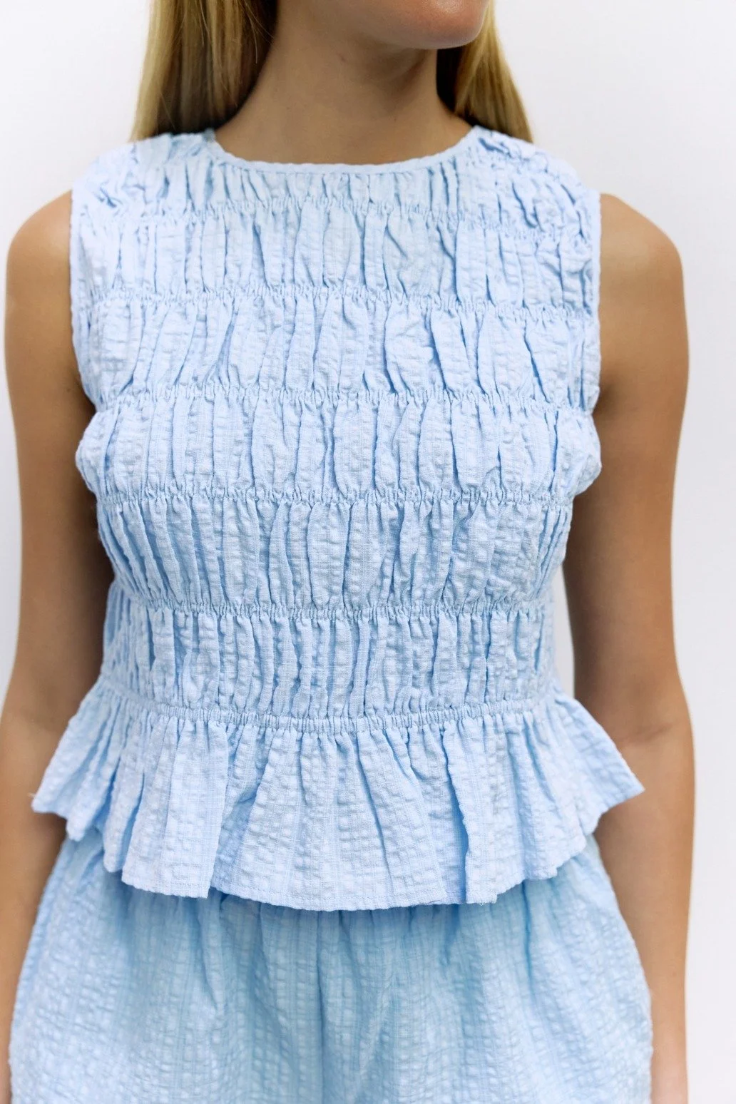 The Allyson Smocked Sleeveless Blouse Blue Seersucker