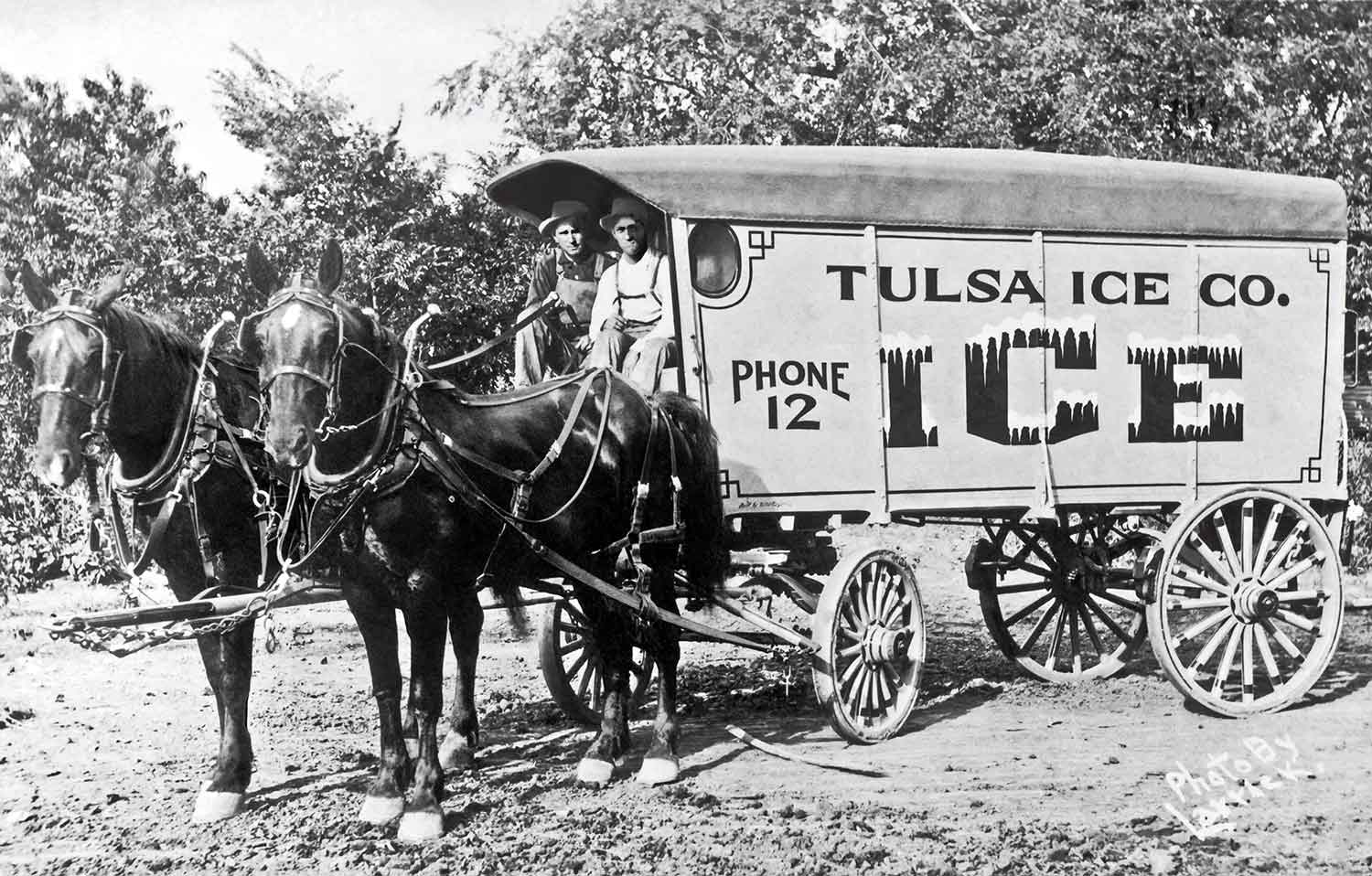 Image I found of two men in a Tulsa Ice Co. wagon (Circa 1936). The man on the left is my Grandfather Clyde Morris.