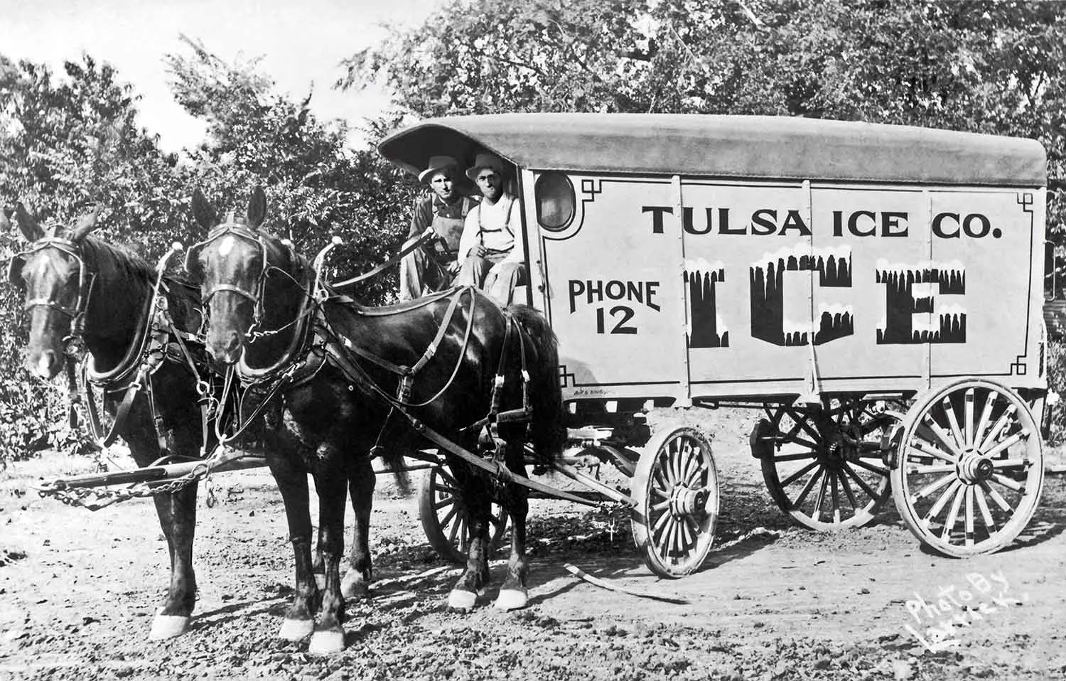 Image I found of two men in a Tulsa Ice Co. wagon (Circa 1936). The man on the left is my Grandfather Clyde Morris.