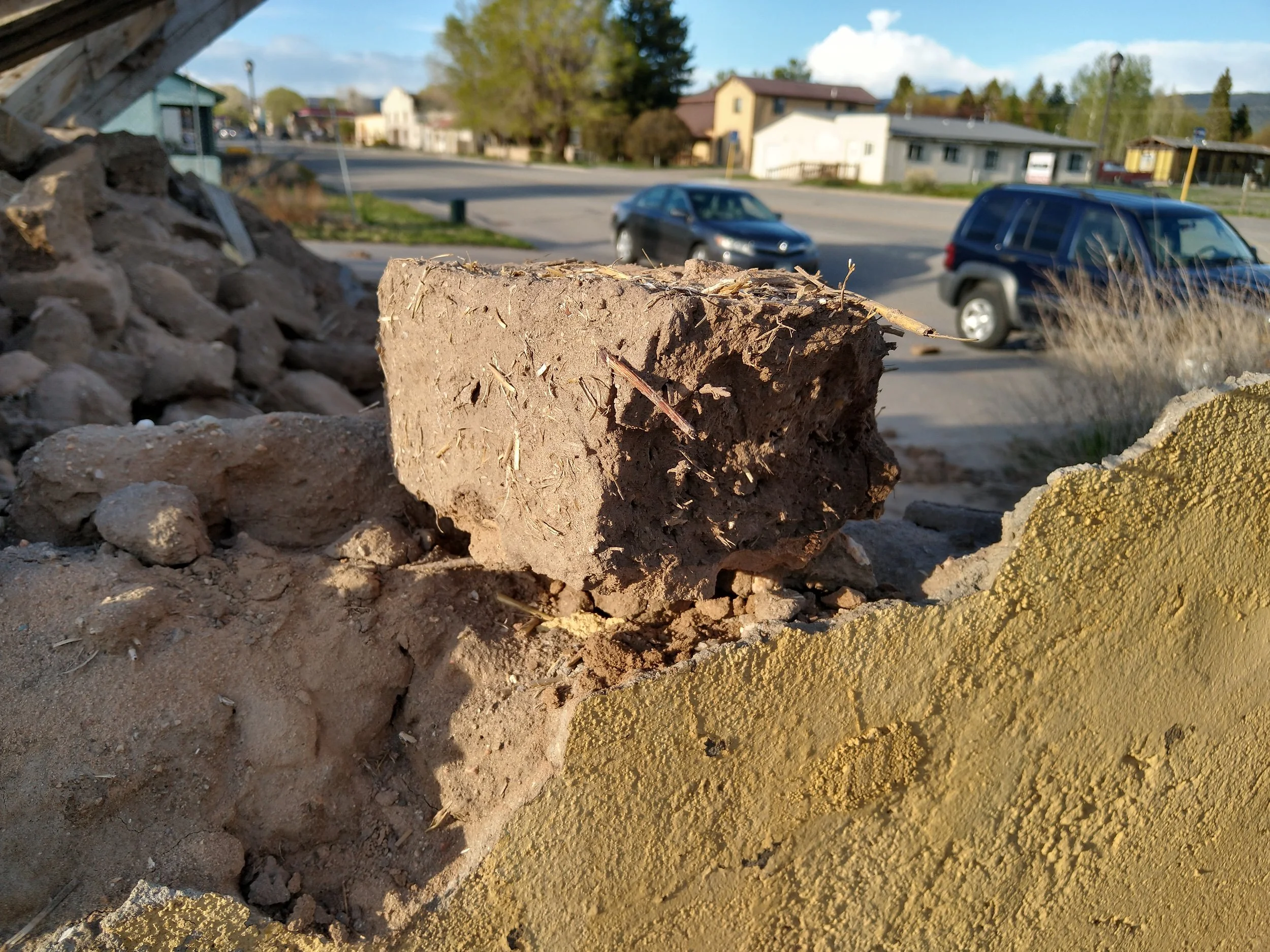 Historic adobe brick recovered after a building fire in San Luis, Colorado.