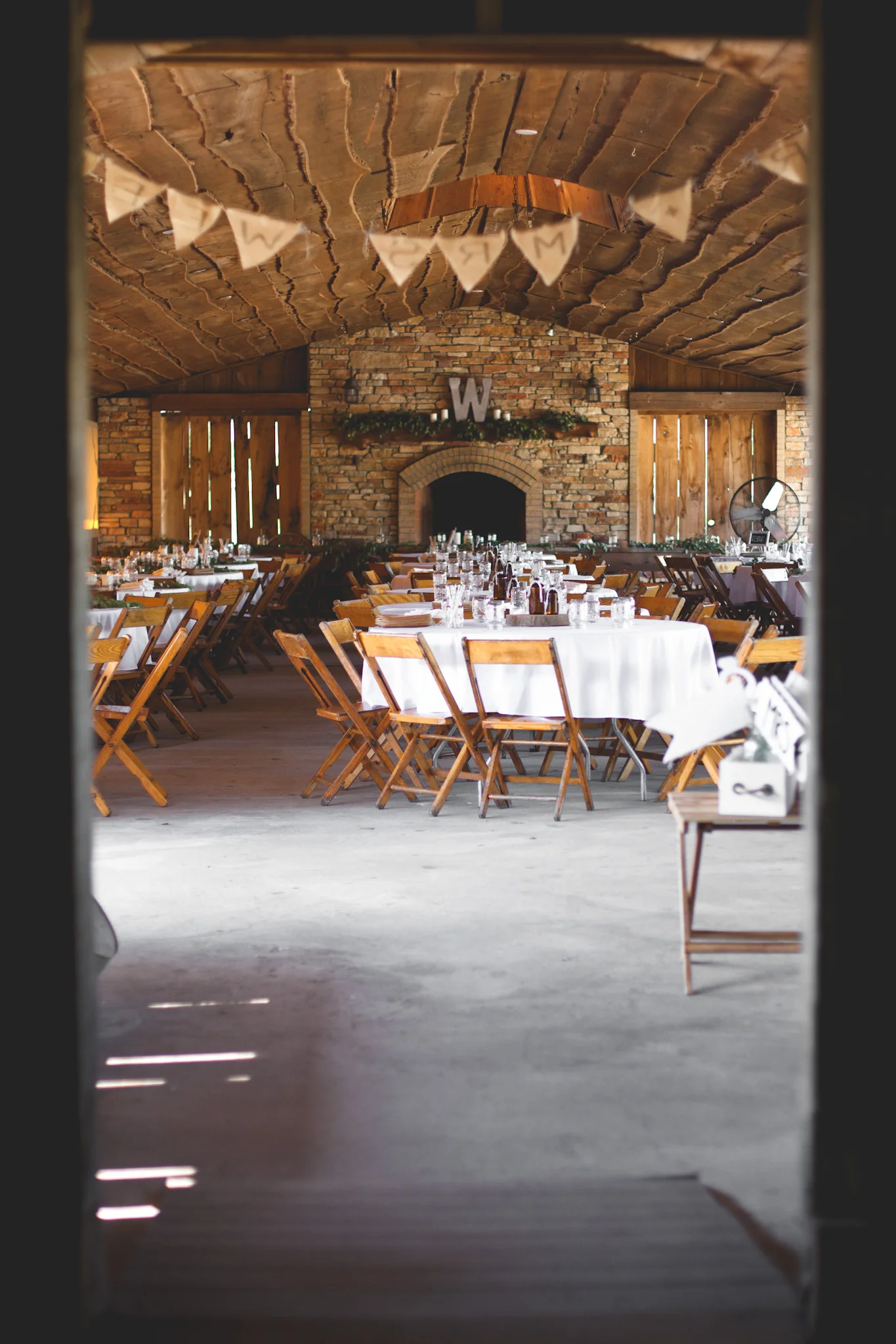 Our reception venue is the most gorgeous venue ever and I'm not biased at. all. ;) I really didn't have to do much decorating, the venue was just so naturally beautiful in itself. Here's a shot mid set-up before the windows were opened and finalized details were finished. Venue: The Red Barn Experience, La Porte, Indiana Photo: brynnhinesphoto.com