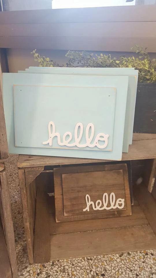 Hello! These handmade signs are the perfect gift! They're so cute & great for entryway decor. Kim has several different color options. I have the "Hello" sign in black, but I also love the natural wood and aqua options.