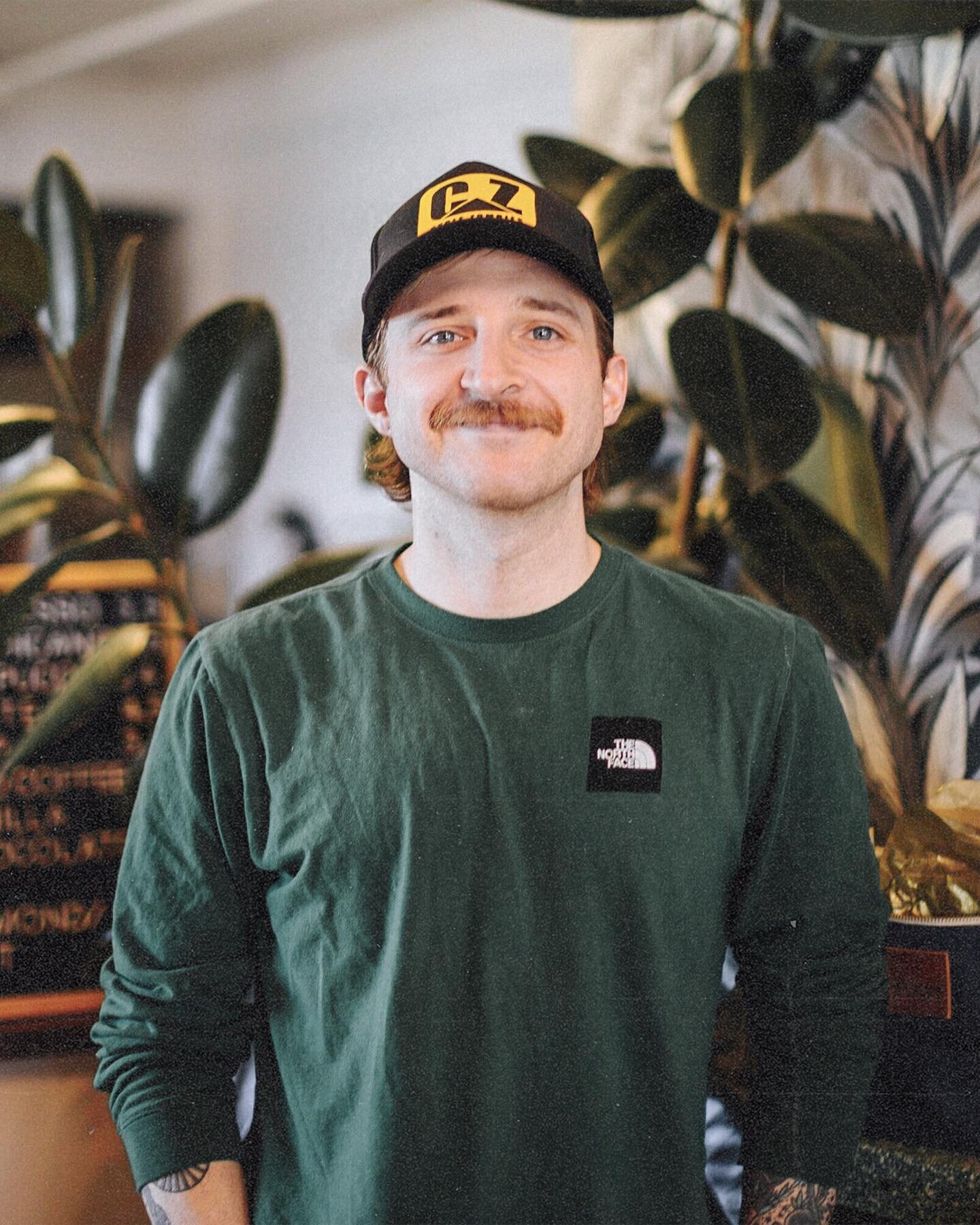 Meet Tyler!
Dog dad, coffee roaster &amp; latte art extraordinaire, Tyler makes all our coffee taste good. If you&rsquo;re ever interested in chatting coffee or philosophy, he&rsquo;s the man. You can find him over @ the Tasting Room behind the bar o