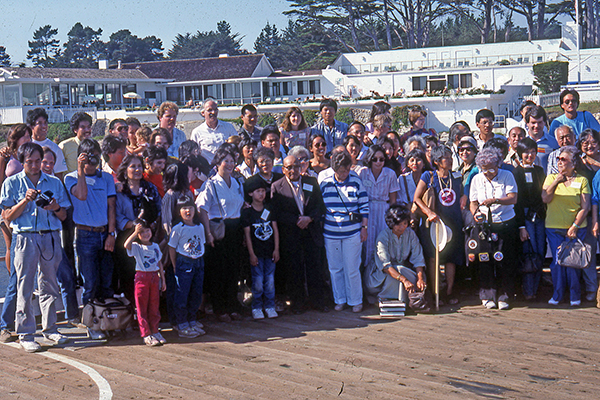 June family reunion, October, 1987. "Baby Bert" Jung in front row middle. Beach club is white building behind, located exactly on the site of the Jung ancestral home.