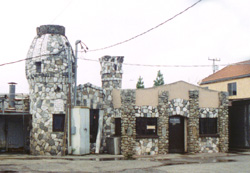 Raymond Kitchen's handiwork at 1211 Fair Avenue. The cylindrical building was originally a fireplace, with the bulbous extension on top acting as the chimney. The windows were added later