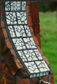 The ornate abalone shell inlay in the front gate. 