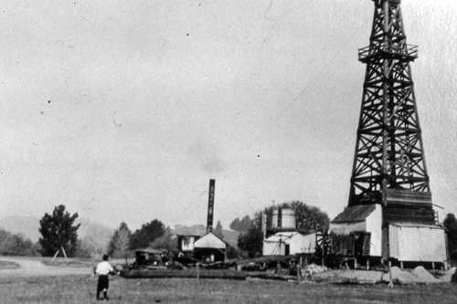 Oil drilling derrick, De Laveaga Park, Santa Cruz, c. 1926. Local subscribers funded an oil-drilling project on public lands that drilled fitfully (with each infusion of investor money) from 1924 through 1927, reaching a final depth of 3,400 feet, finding only traces of oil.