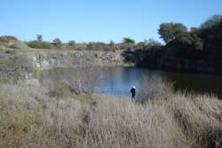 One of the bitumen mine pits that still pockmark the North Coast
