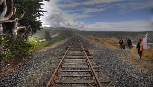 Looking south as railroad line crosses the trestle-rampart across San Vicente Beach, near Davenport. 