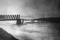 A winter flood in February, 1881 broke not only the railroad's trestle across the San Lorenzo River, but also the company's financial back as well. 