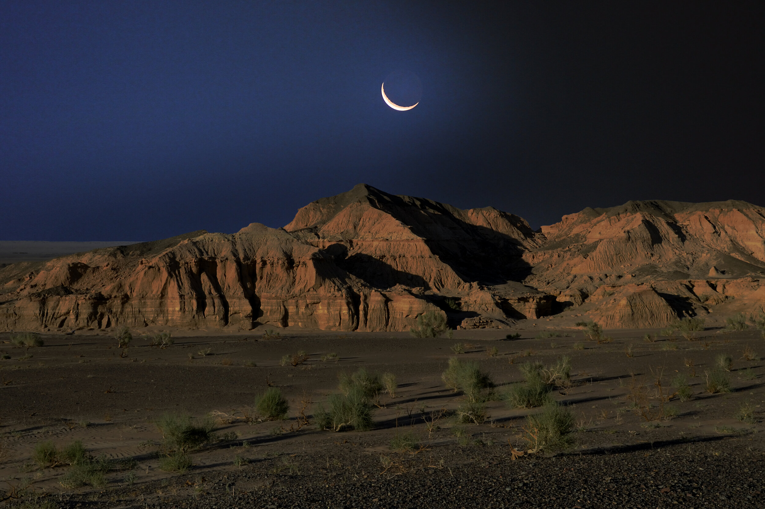 © Marc Progin 'Midnight blue moon on flaming cliffs | Lune bleu nuit sur falaise flamboyante' Mongolia, 2016_Courtesy of Blue Lotus Gallery.JPG