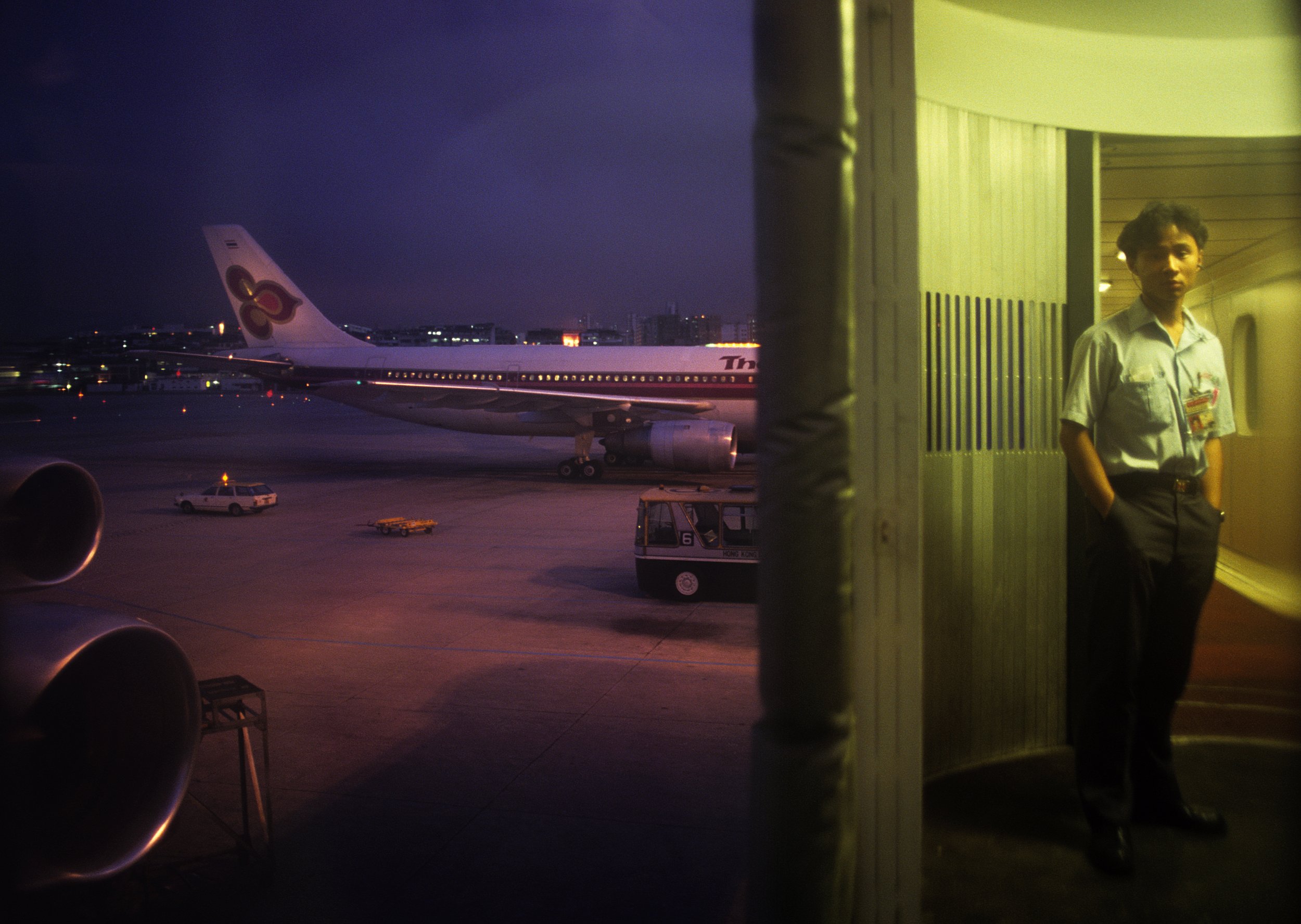 Greg Girard, Arriving Kai Tak Airport from Beijing in June, Hong Kong 1989, Courtesy of Blue Lotus Gallery.jpeg