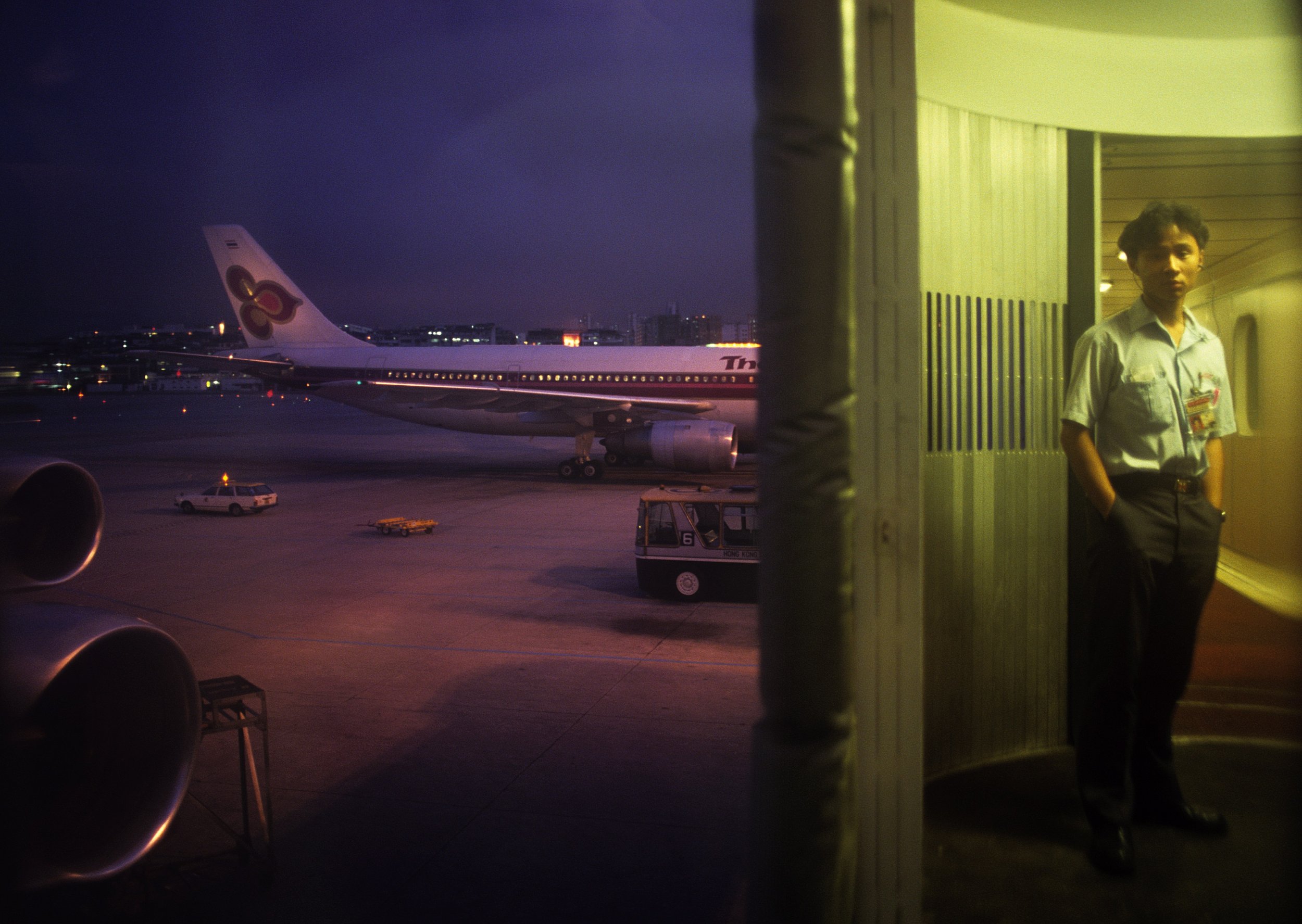Greg Girard, Arriving Kai Tak Airport from Beijing in June, Hong Kong 1989, Courtesy of Blue Lotus Gallery