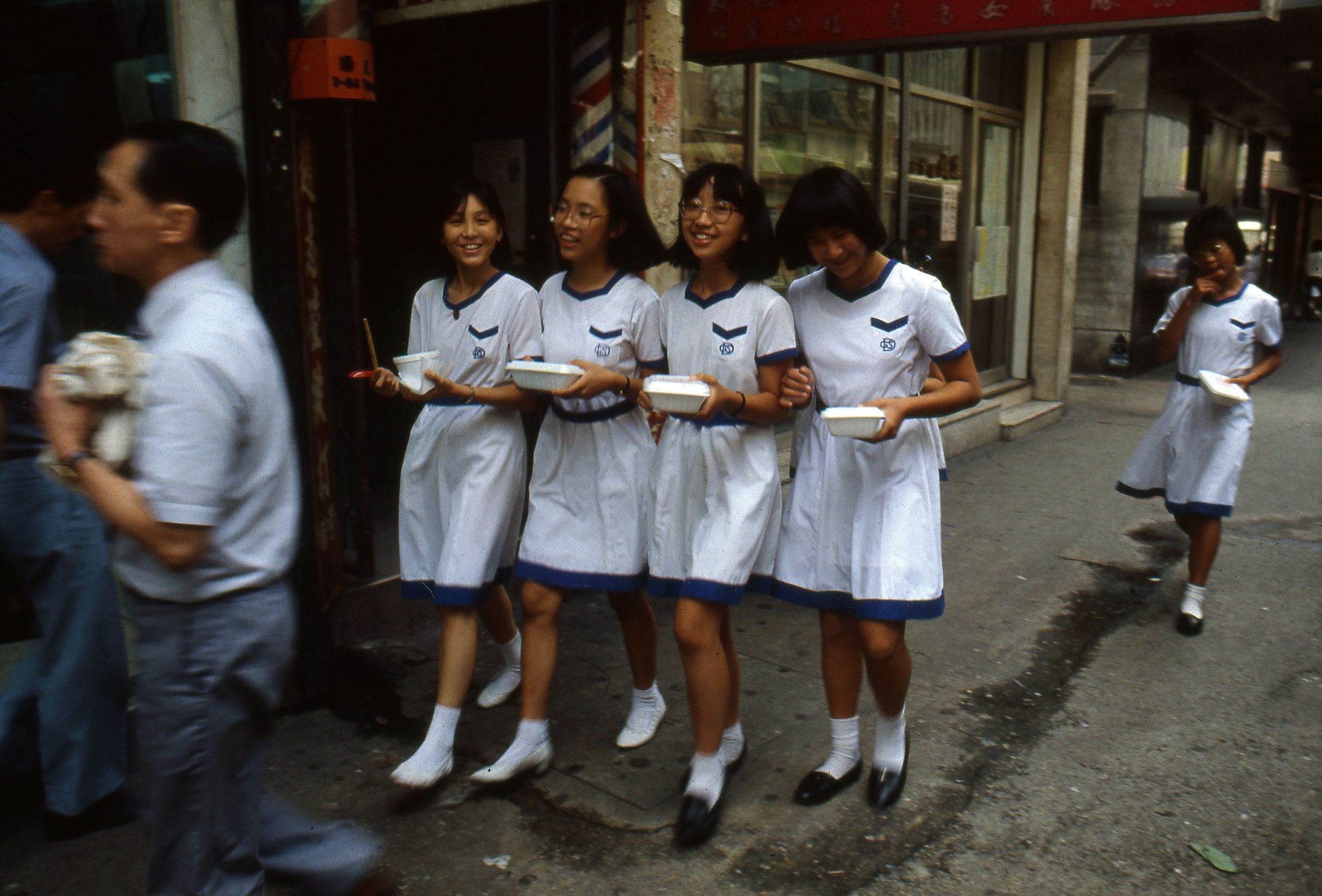 Greg Girard, Four Schoolgirls, Yaumatei, Hong Kong 1983, Courtesy of Blue Lotus Gallery